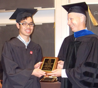 Chukiat Phonsom receives the Rohn Truell Prize from Professor Sandstede